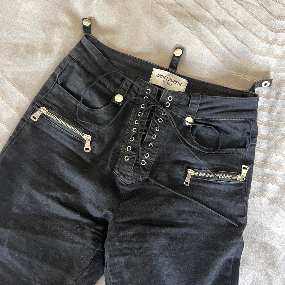 Saint Laurent pairs black jeans flares